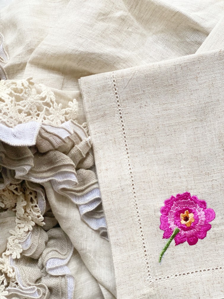 Pansy embroidered linen dinner napkins – Gokhale Foundation